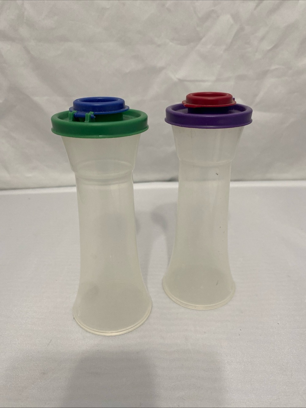Tupperware Clear Salt and Pepper Shskers with Green & Purple Tops